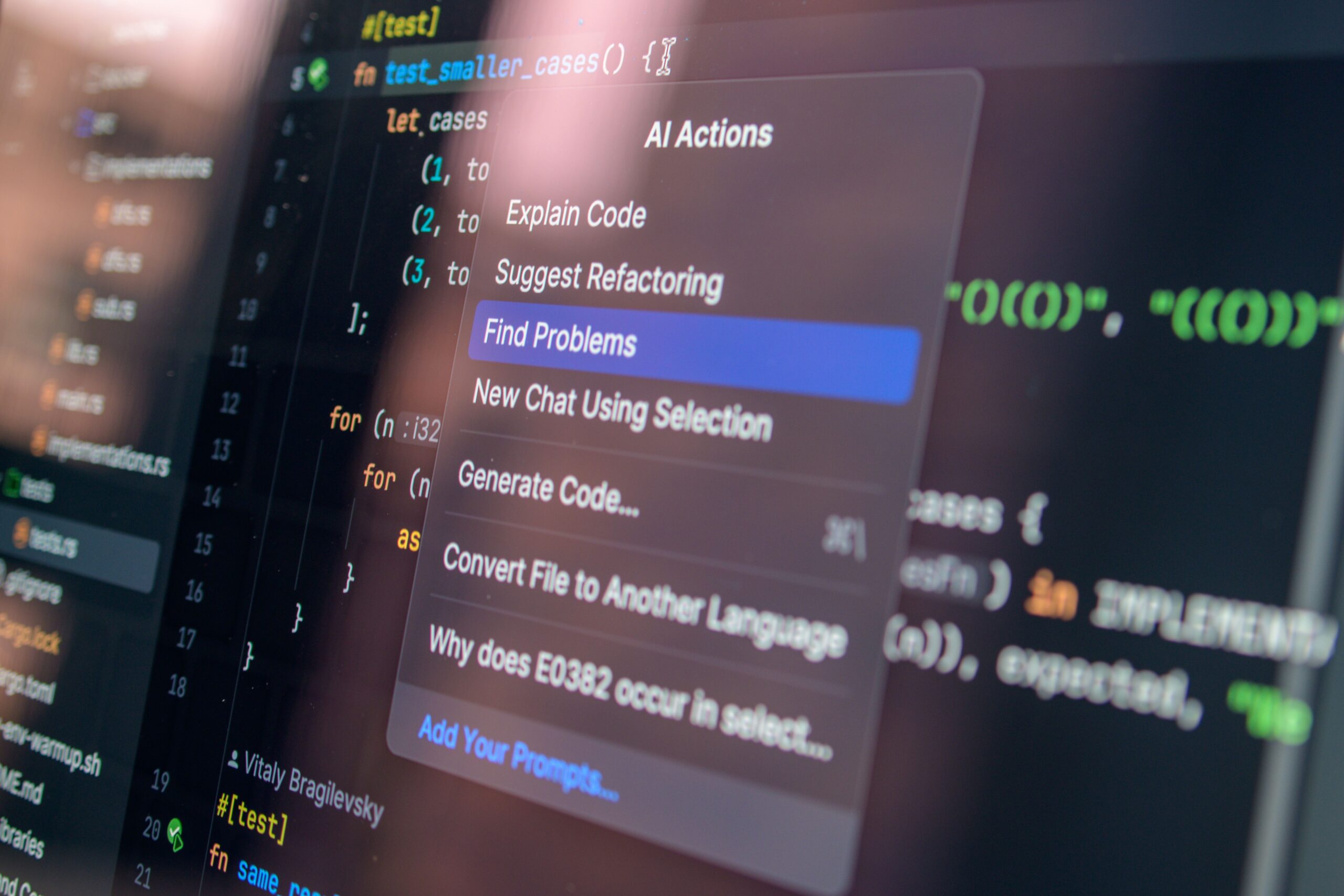 AI-assisted coding on a laptop screen, illustrating how AI agents are used in software development teams in 2026